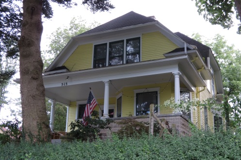 The house is a form of Dutch Colonial and features large windows throughout.